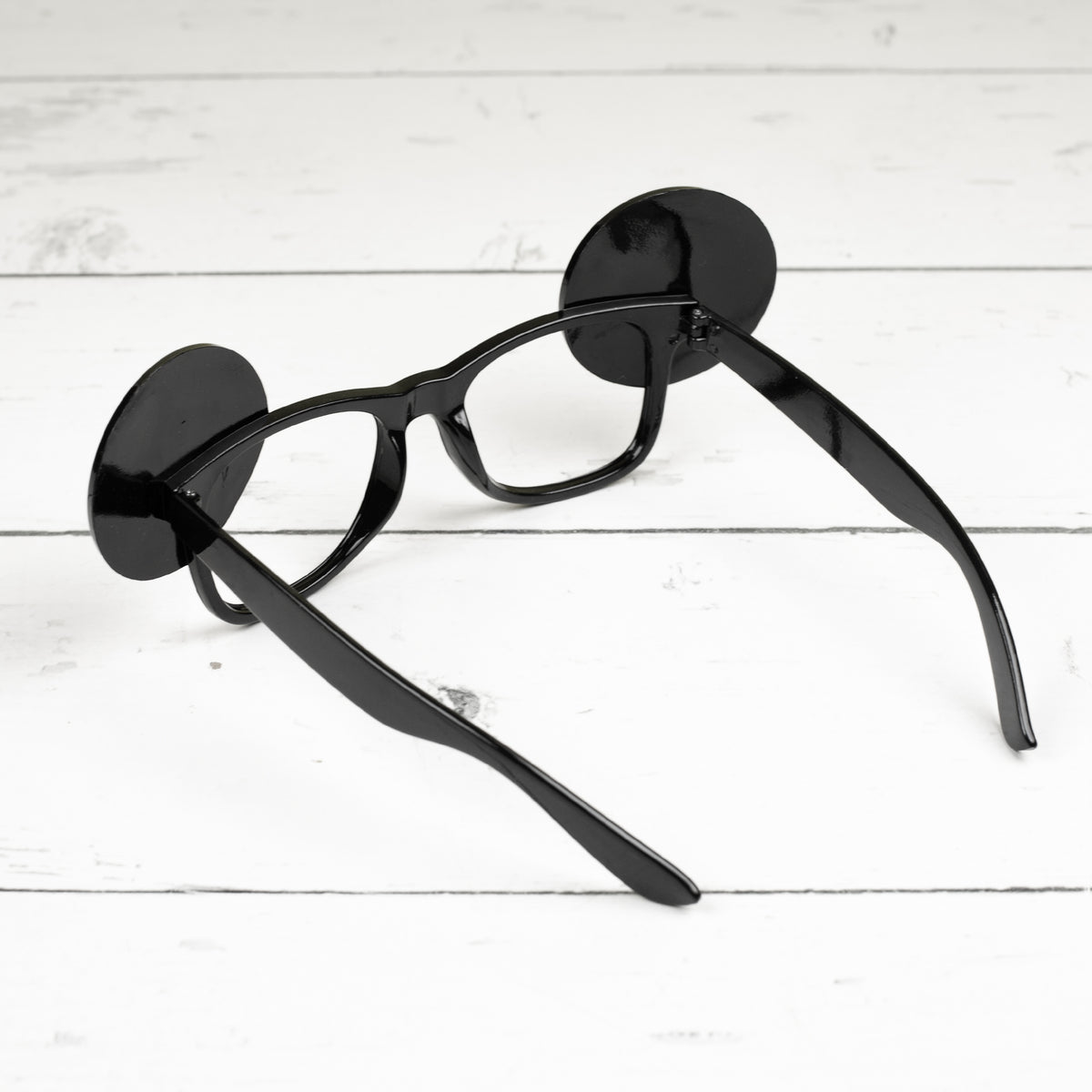 Rückansicht der Spaßbrille 40 im Verkehrszeichen-Look aus schwarzem Kunststoff