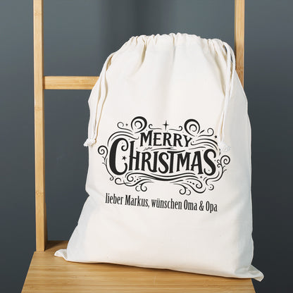 Personalisierter Baumwoll-Geschenksack mit Merry Christmas Motiv und Wunschtext zu Weihnachten