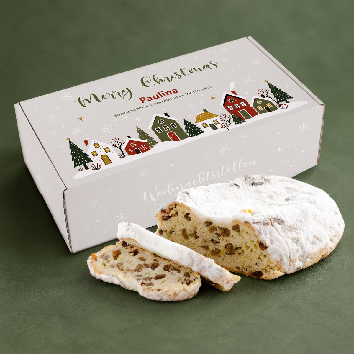 Weihnachtsstollen mit personalisierter Geschenkbox, Name Paulina und winterlichem Merry Christmas Motiv auf grünem Hintergrund