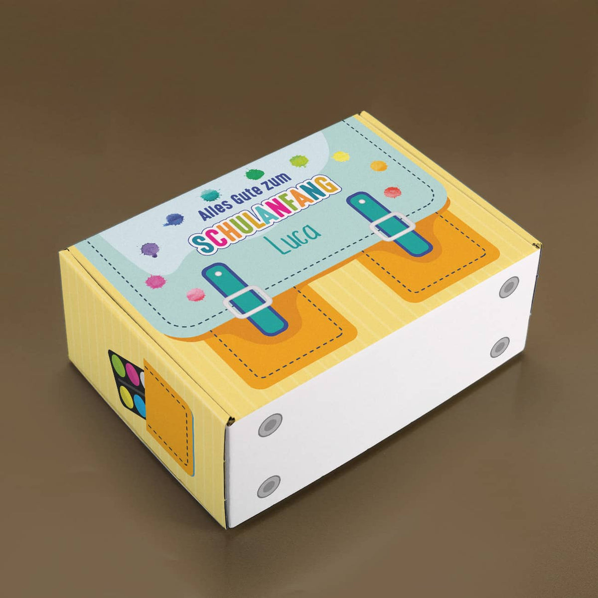 Geschenkset zur Einschulung in Verpackung in Ranzen-Optik