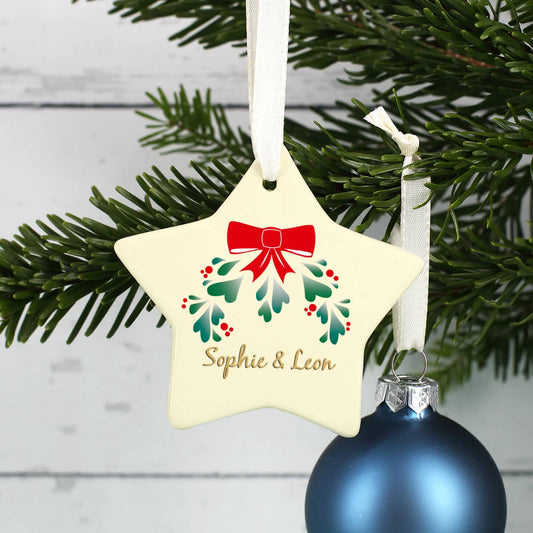 Weihnachtsbaumschmuck aus Keramik in Sternen Form mit Wunschnamen