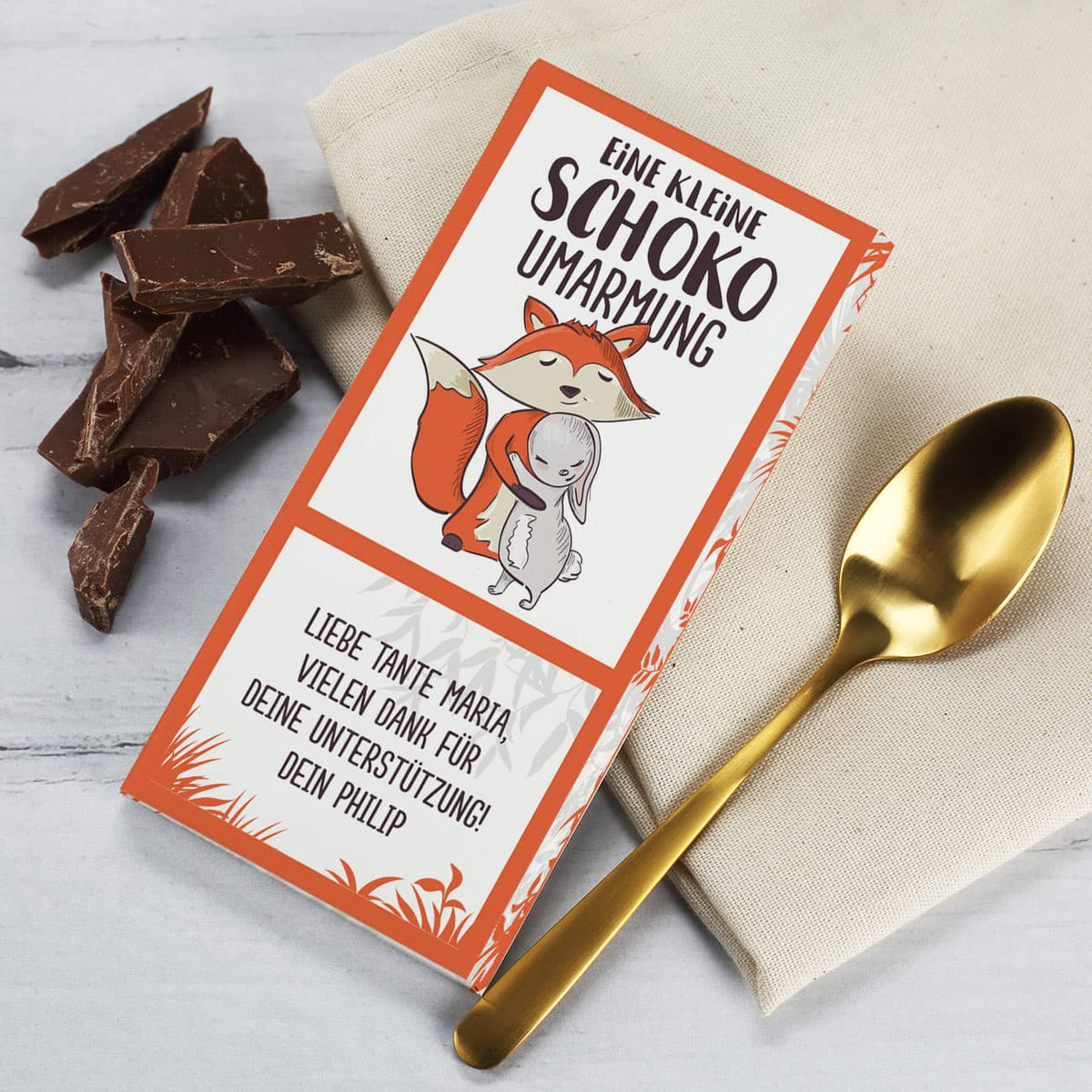 Eine kleine Schoko Umarmung mit Fuchs und Hase bedruckt