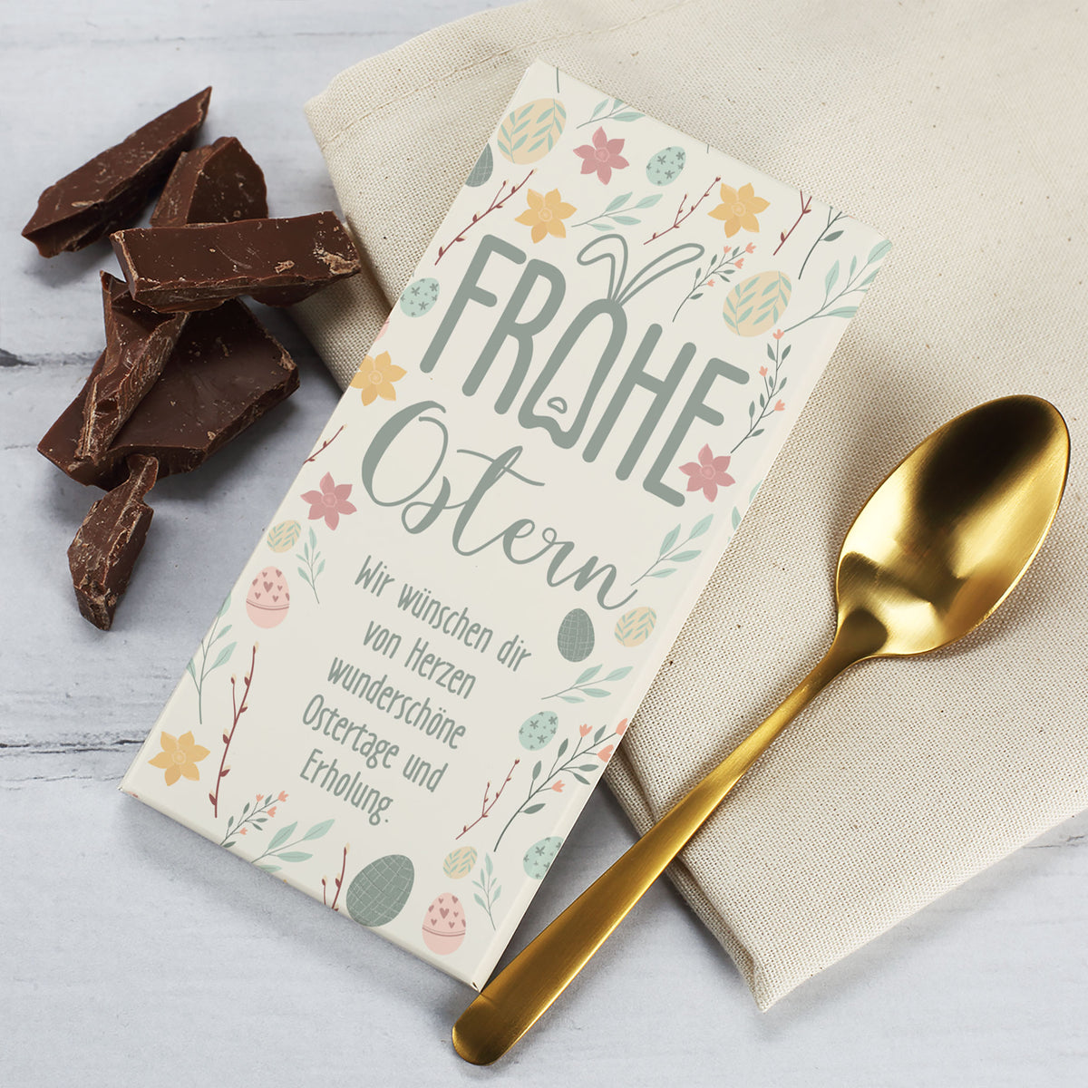 Schokoladentafel zu Ostern mit Wunschtext und pastellfarbenen Motiven | 100g
