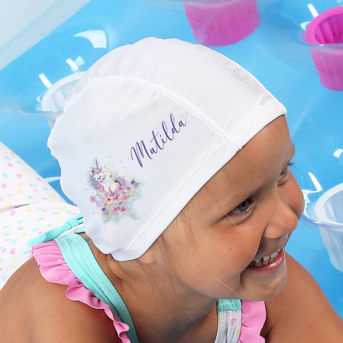 Kinderbadekappe mit Einhorn-Motiv und Name bedruckt