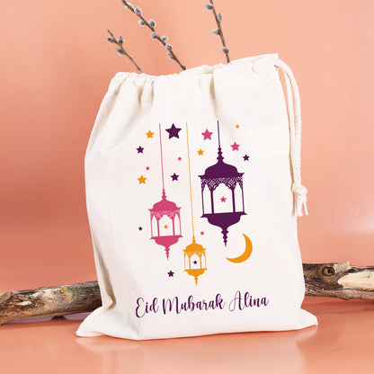 Kleiner Eid Geschenksack mit Laternen und Text in lila