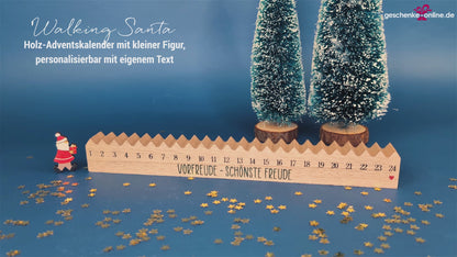 Adventskalender aus Holz mit versetzbaren Weihnachtsmann